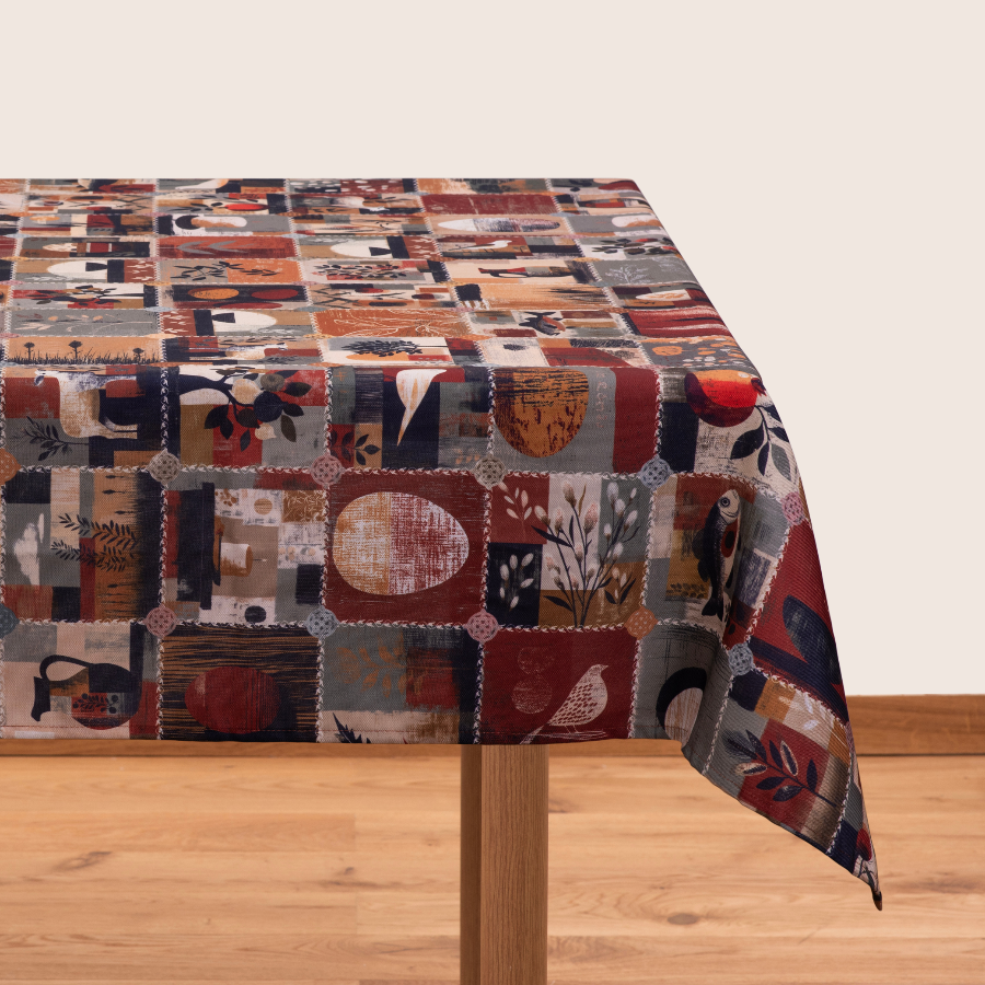 Puroba tablecloth with colourful patchwork pattern and symbolic motifs