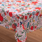 Light cream tablecloth with pomegranate and floral pattern laid flat